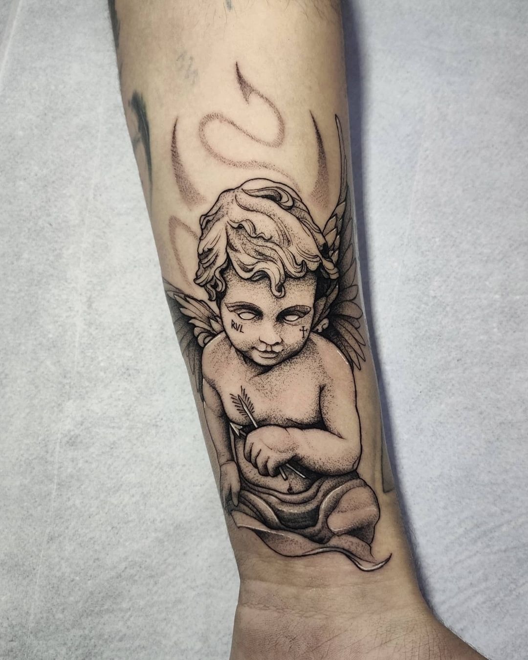 Bold Cherub With Arrow Tattoo Tattoo Design