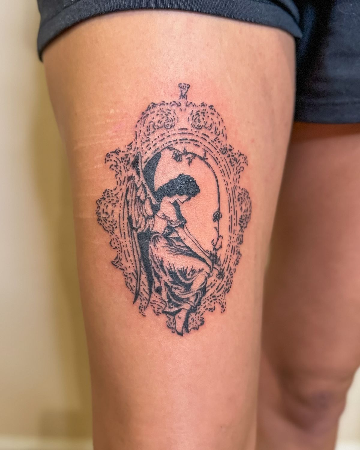 Framed Fallen Angel Thigh Tattoo Tattoo Design