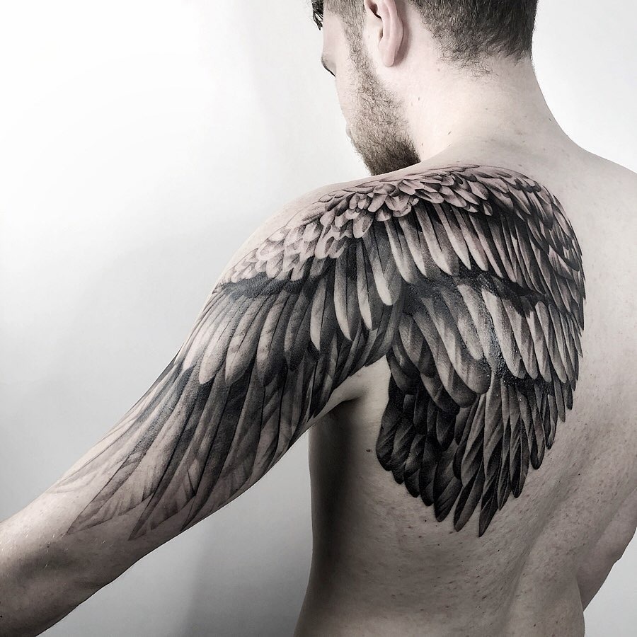 Bold Black and Gray Angel Wing Shoulder Tattoo Tattoo Design