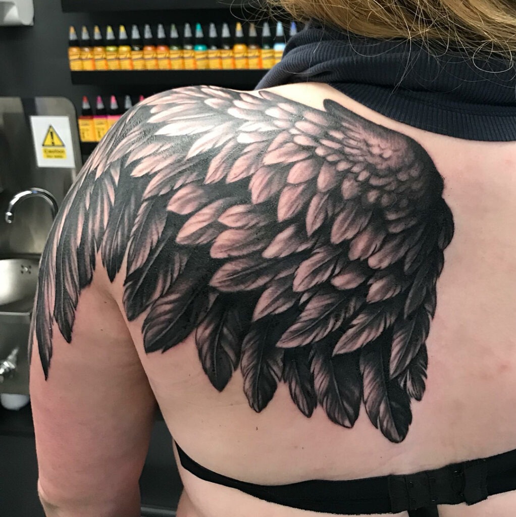 Bold Shoulder-Spanning Angel Wings Tattoo Tattoo Design