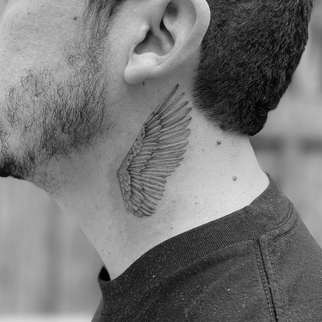 Minimalist Single Angel Wing Tattoo on Ankle Tattoo Design