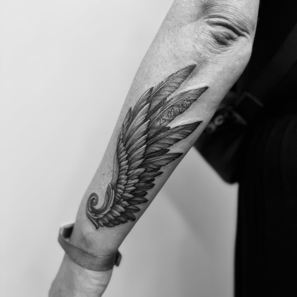 Realistic Angel Wing Forearm Sleeve Tattoo Design