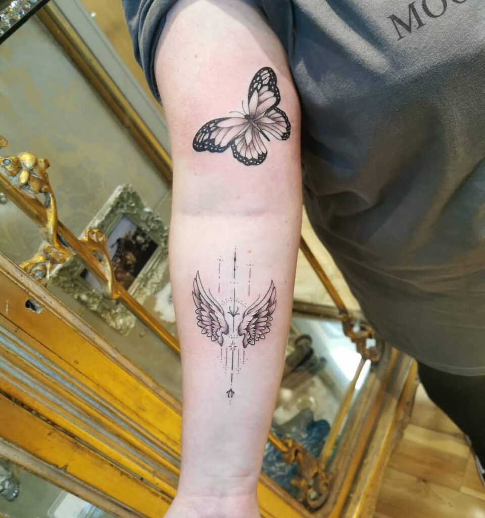 Realistic Angel Wing Forearm Tattoo with Birthdate Tattoo Design