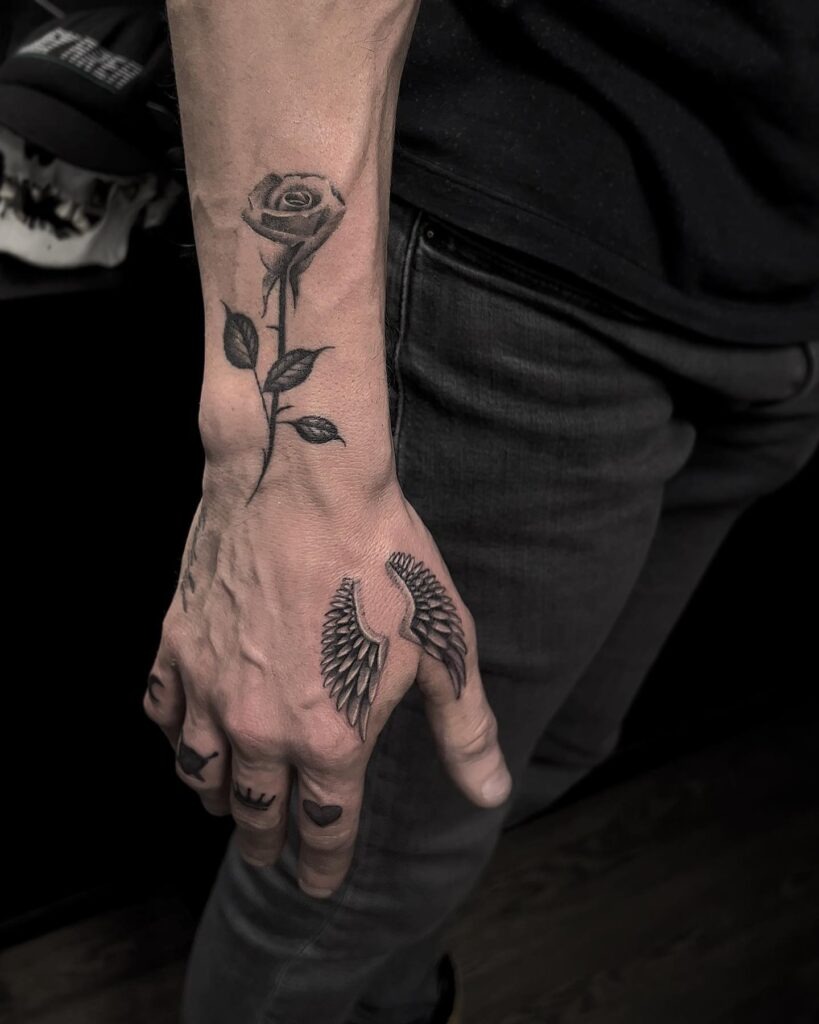 Tiny Angel Wings and Halo Wrist Tattoo Tattoo Design