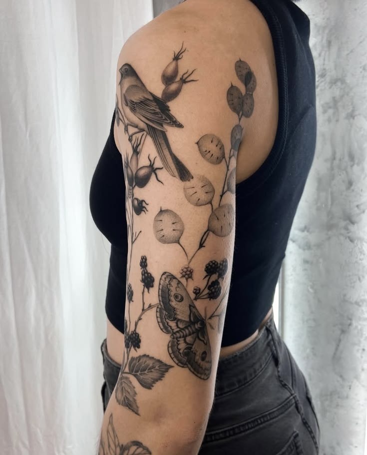 Botanical Bird and Moth Sleeve Tattoo Tattoo Design