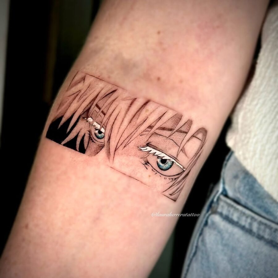 This stunning tattoo showcases a pair of anime eyes, capturing an intense gaze.