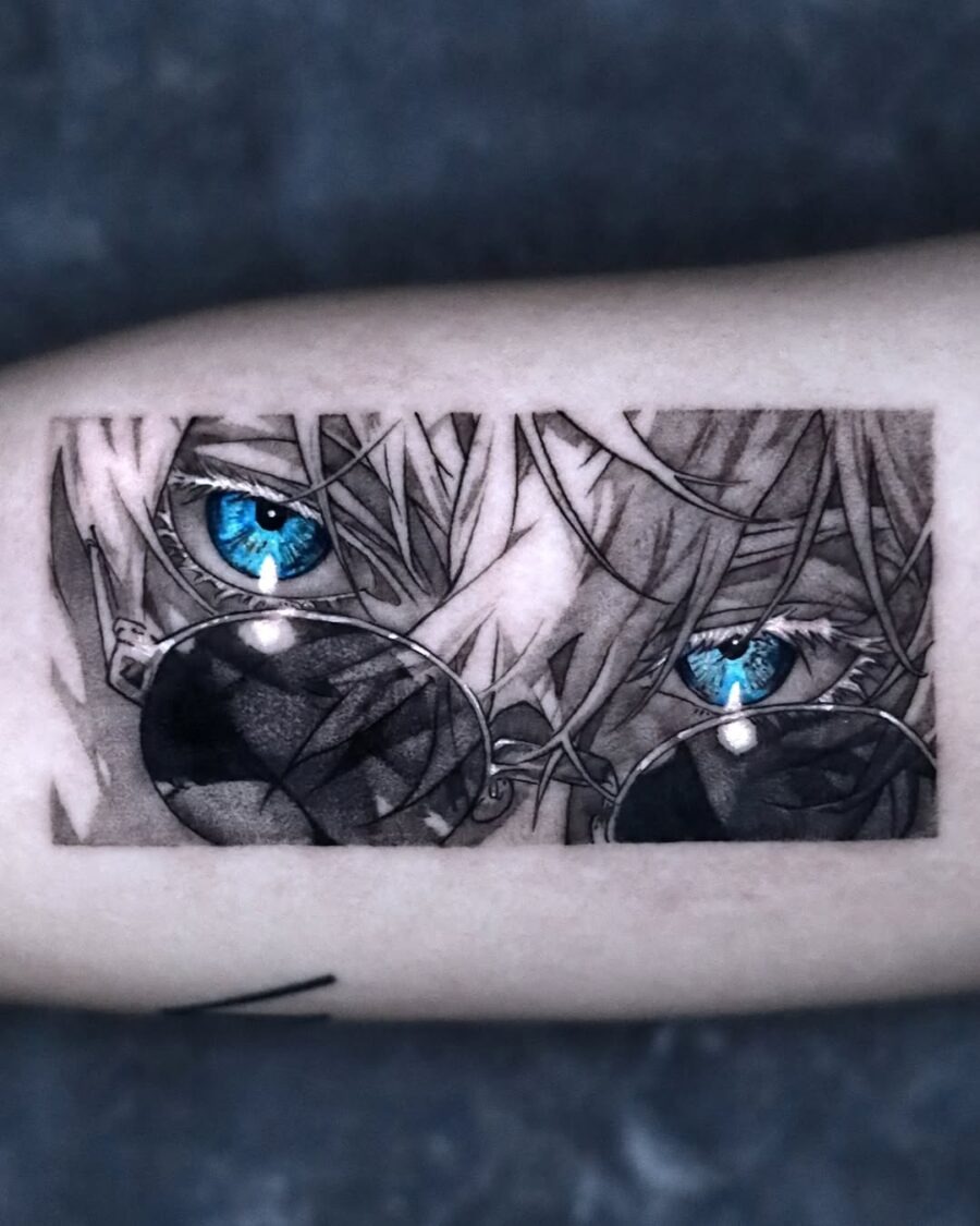 This tattoo features striking anime eyes peering through stylish sunglasses, creating a captivating and artistic vibe.