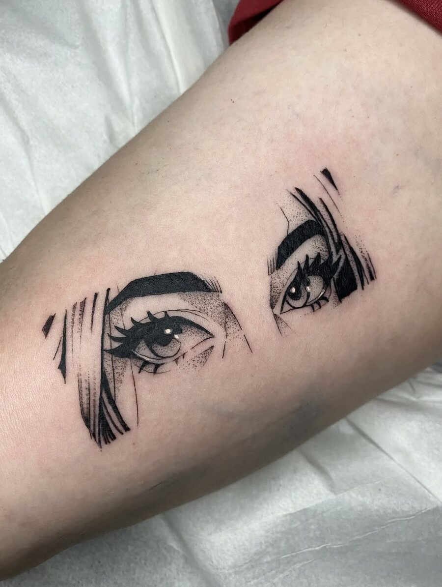 This tattoo features intricately designed anime eyes that convey depth and emotion.