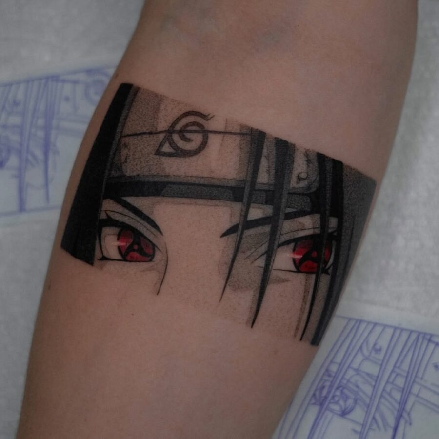 This tattoo features captivating anime eyes adorned in striking red hues.