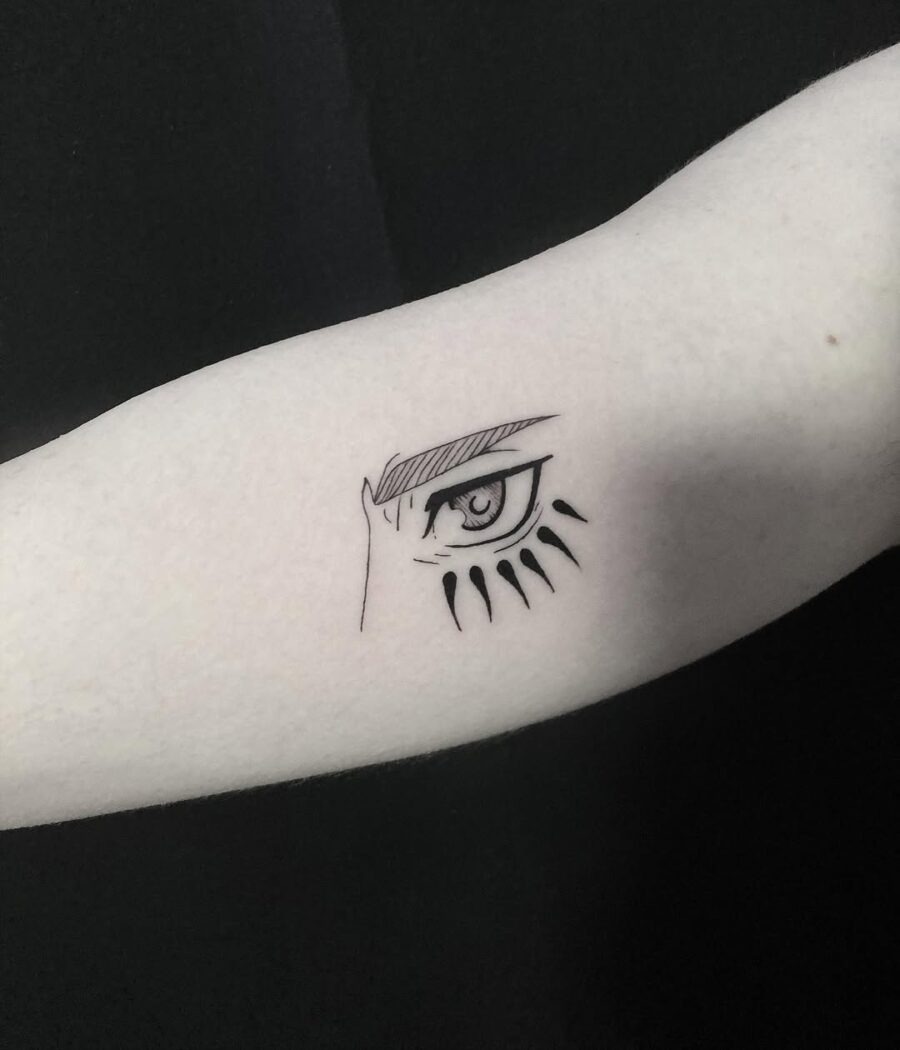 This tattoo showcases a beautifully drawn anime eye, complete with intricate lash and brow detailing.