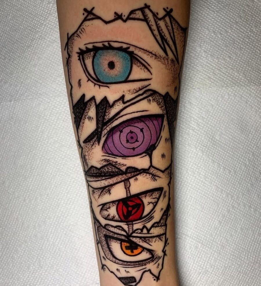 This tattoo features a stunning collection of anime eyes bursting with color on the forearm.