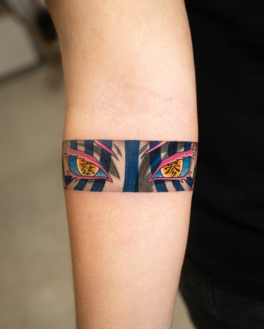 This tattoo showcases an eye-catching anime eye design that pops with color.