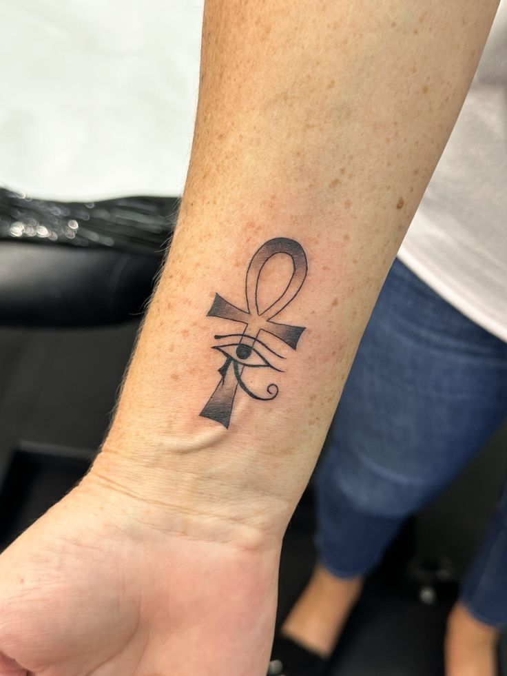 Ankh with Eye of Horus on Forearm Tattoo Design