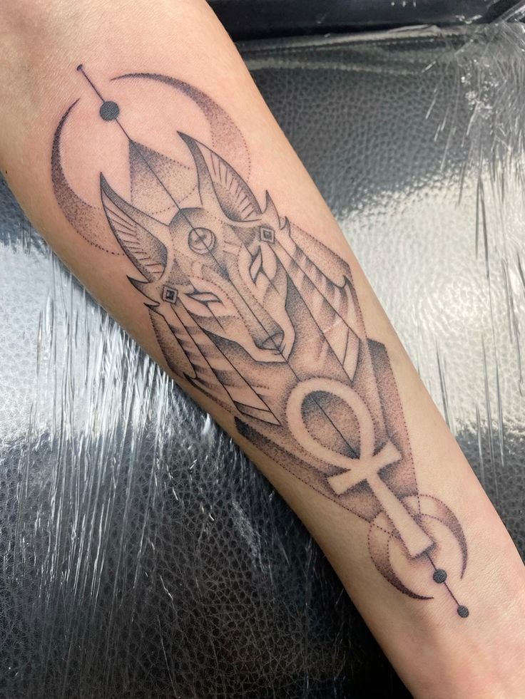 Anubis-Inspired Ankh Tattoo Tattoo Design