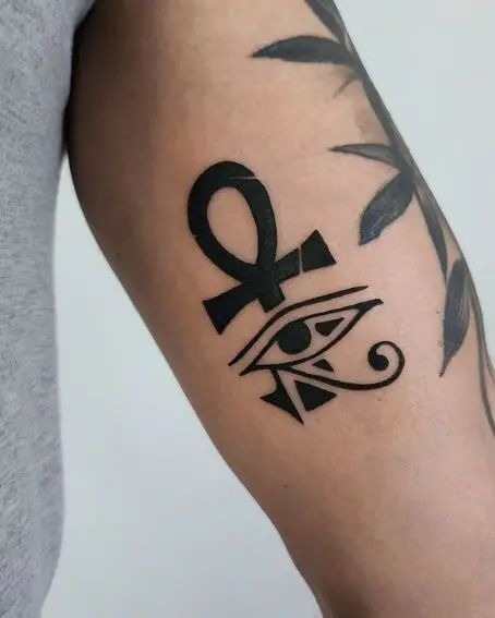 Bold Eye and Ankh Arm Tattoo Tattoo Design
