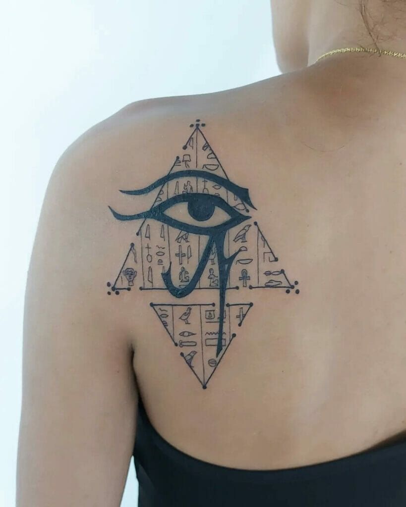 Eye and Ankh-Inspired Back Tattoo Tattoo Design