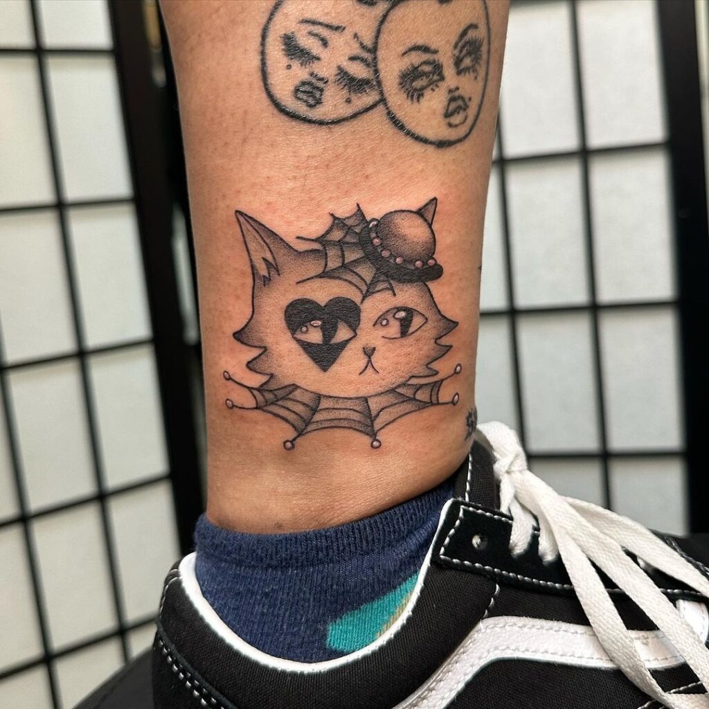 Quirky Cat Ankle Tattoo Tattoo Design