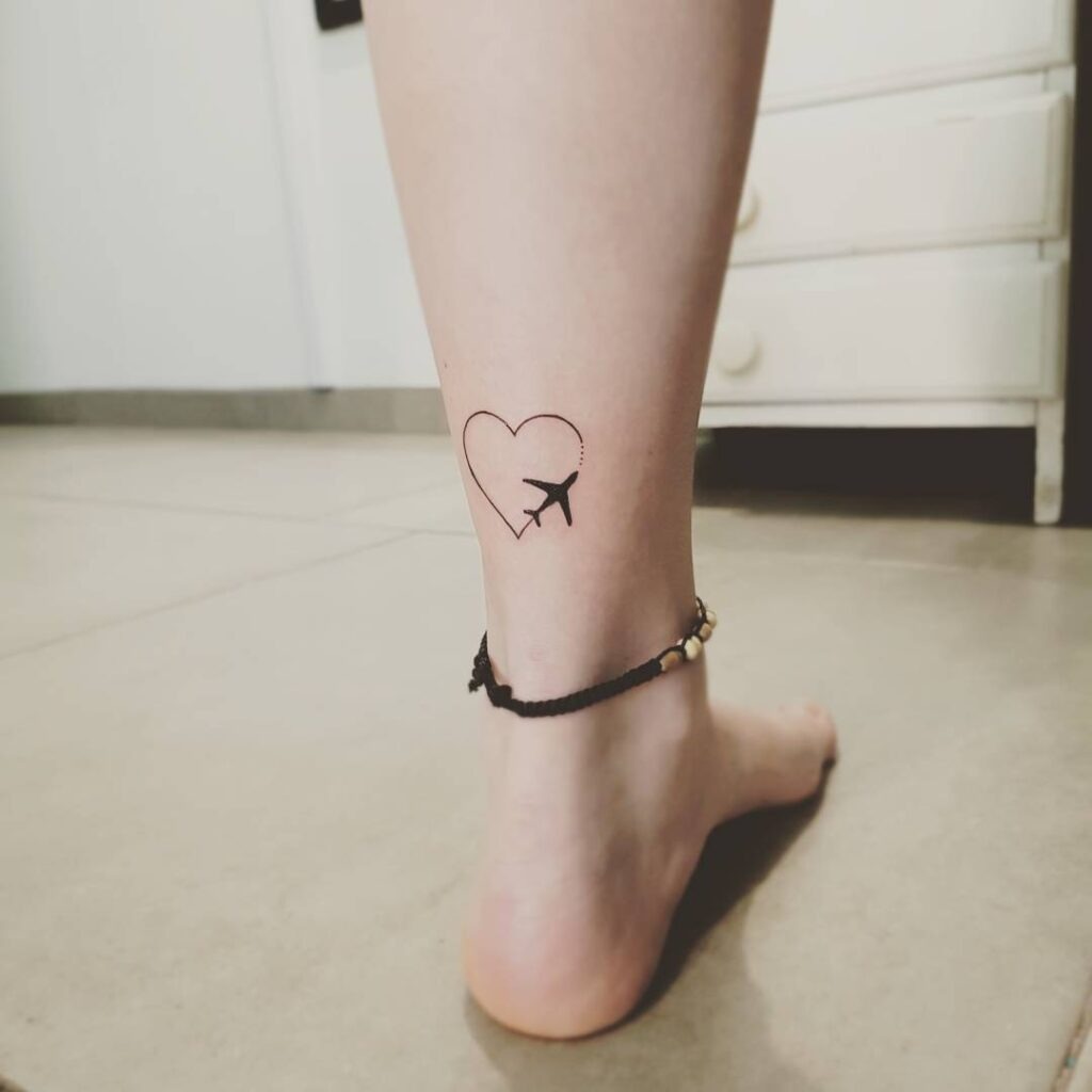 Travel-Inspired Heart and Plane Ankle Tattoo Tattoo Design