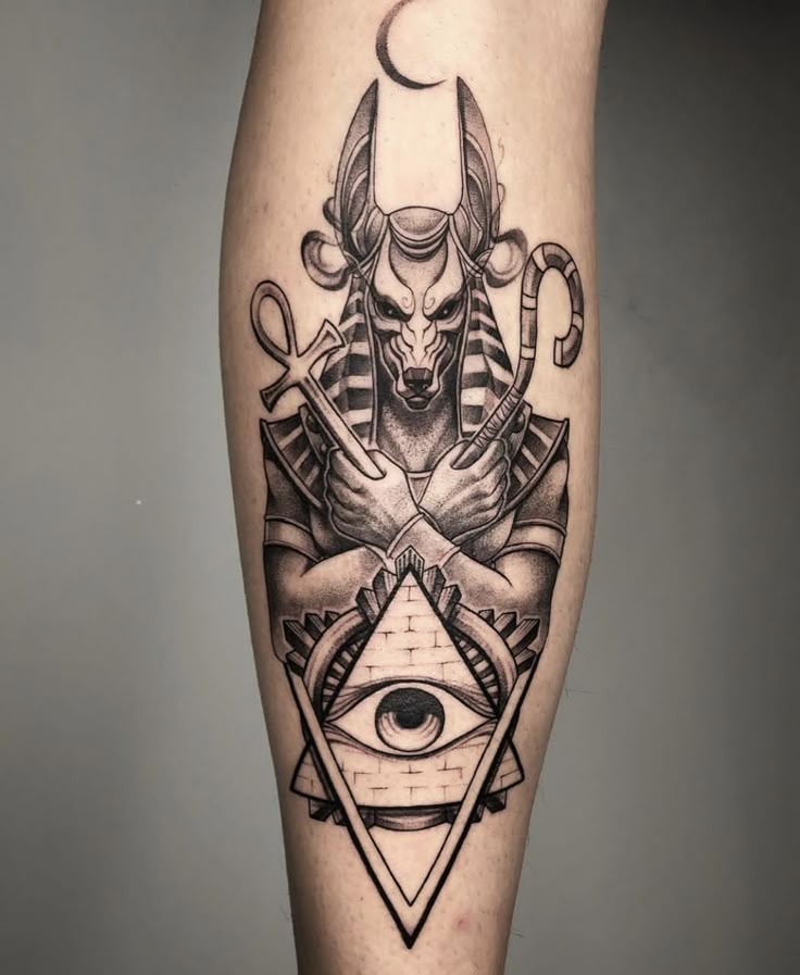 Crossed Arms Anubis with Illuminati Symbol Tattoo Design
