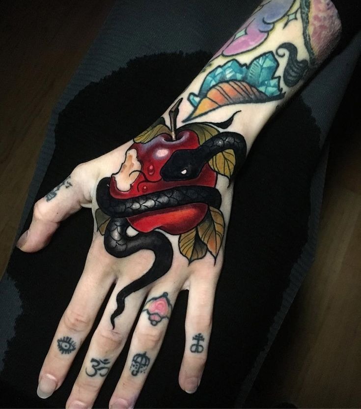 Apple And Snake Hand Tattoo Tattoo Design