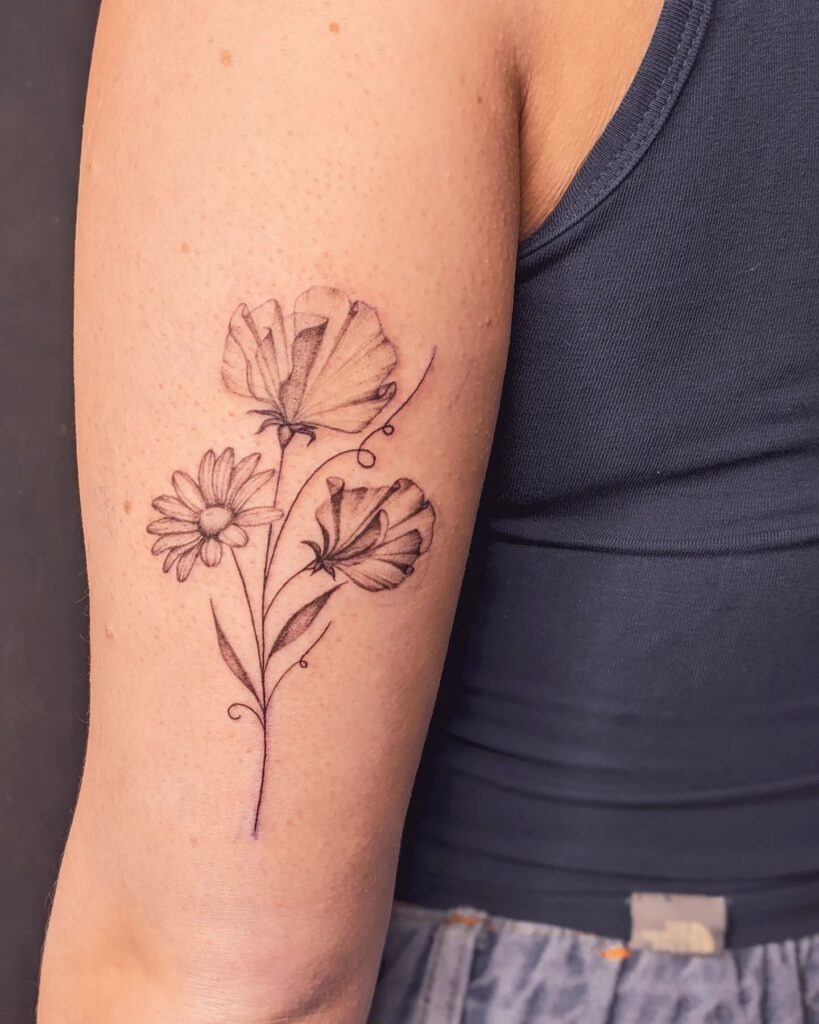 Daisy and Sweet Pea Floral Tattoo Tattoo Design