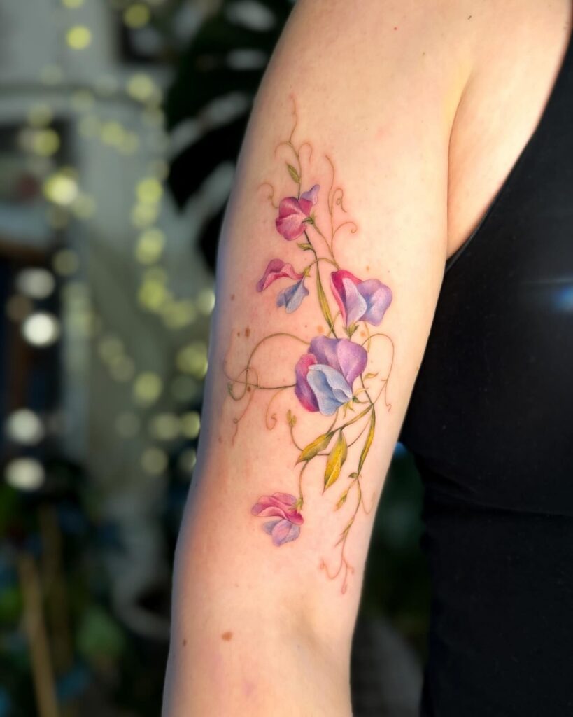Elegant Sweet Pea Rib Tattoo Tattoo Design