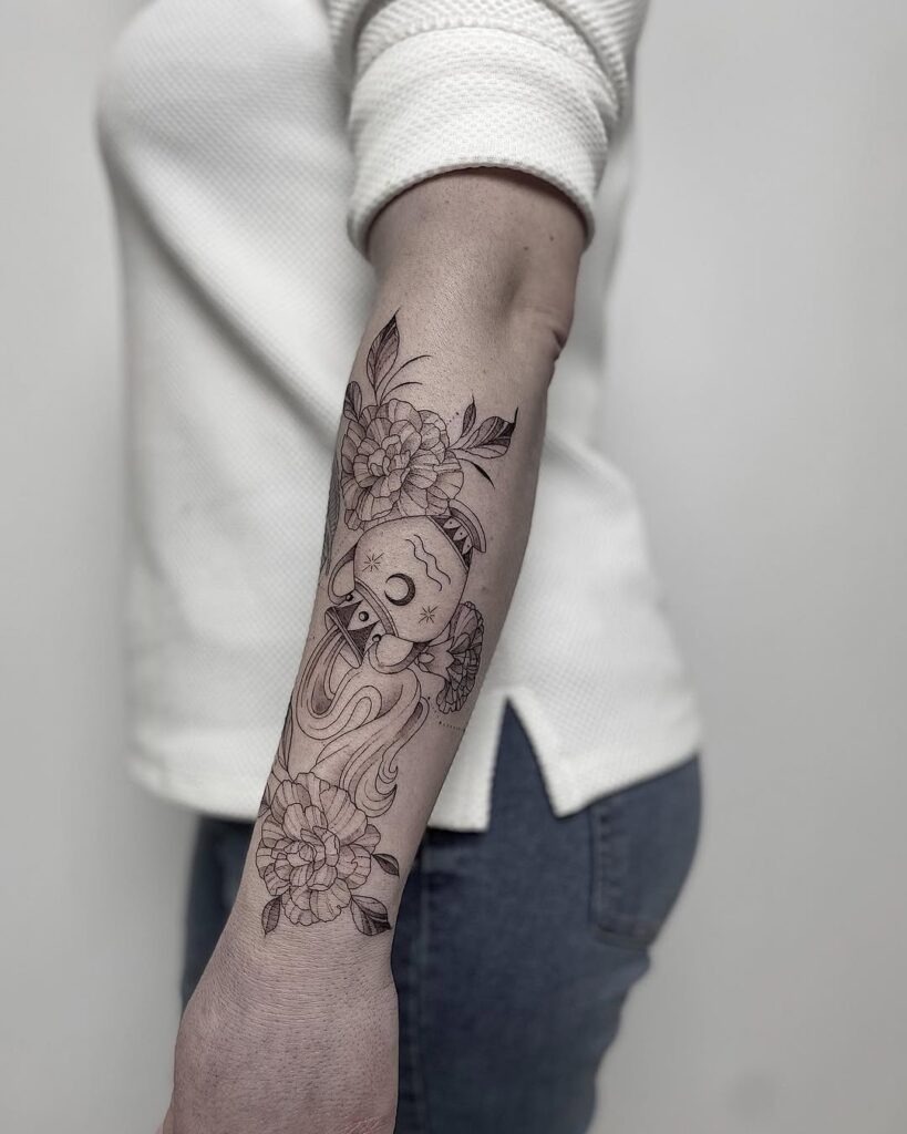 Aquarius Water Vase Forearm Tattoo with Floral Details Tattoo Design
