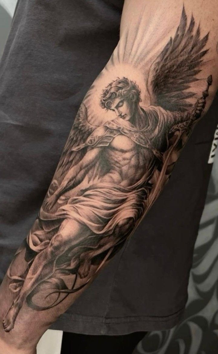 Archangel in Motion with Radiant Light Tattoo Design