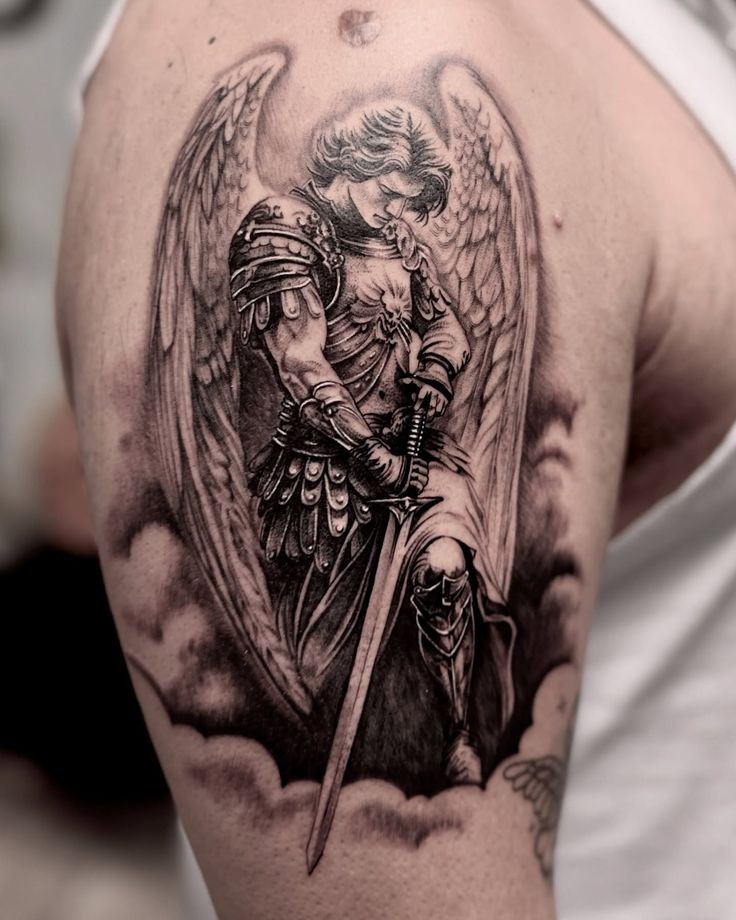 Saint Michael Resting on His Sword Tattoo Design