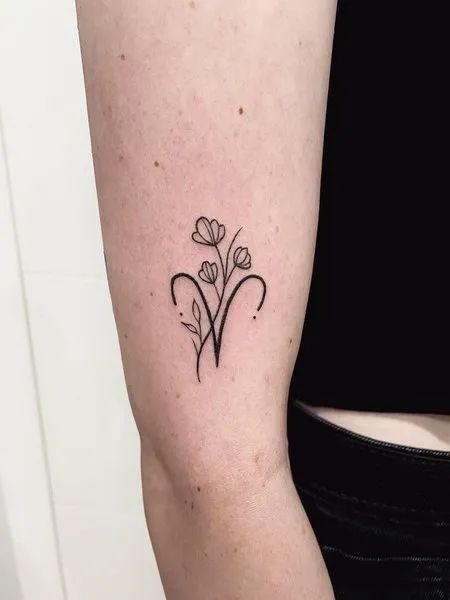 Aries Symbol with Floral Touch Tattoo Design