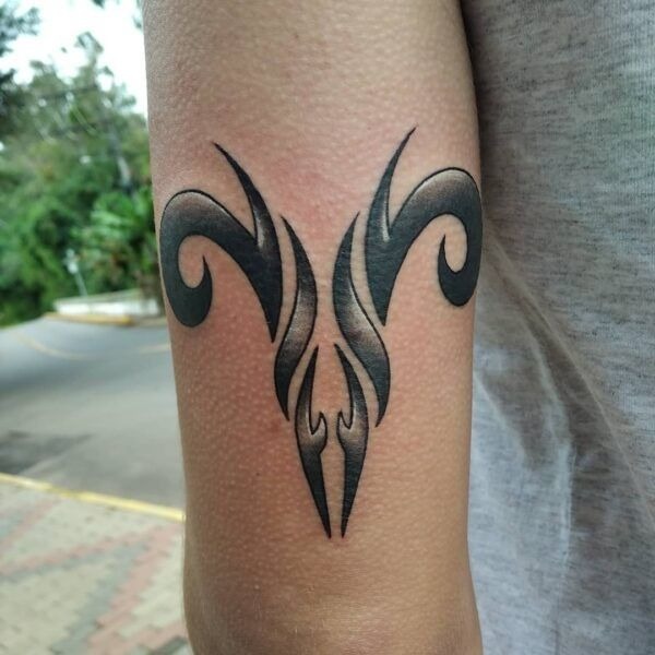 Bold Tribal Aries Symbol Tattoo Design