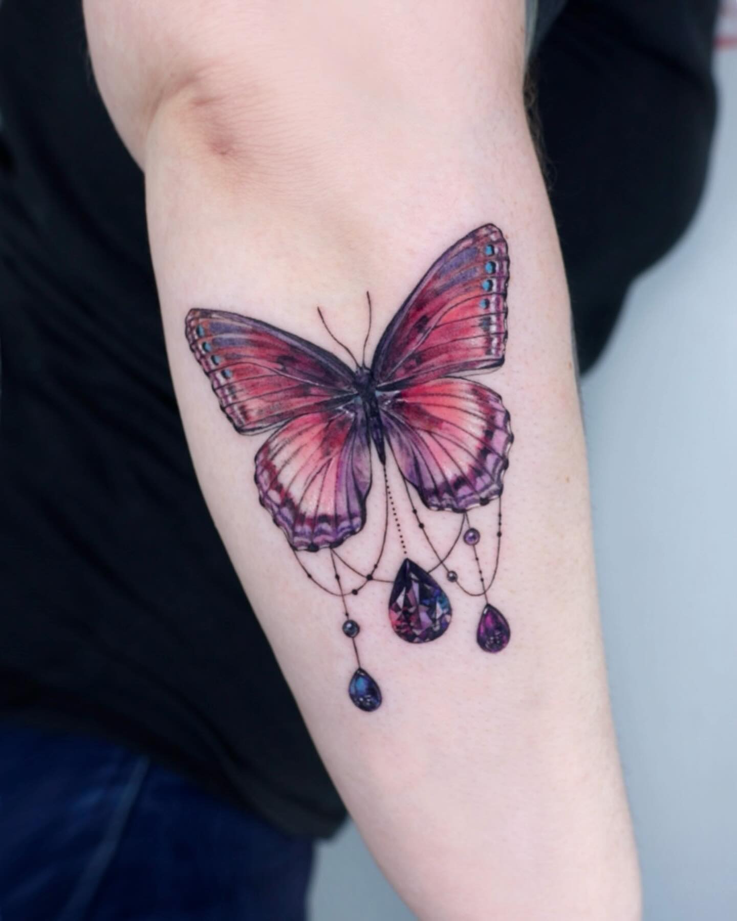 Butterfly With Hanging Gemstones Tattoo Tattoo Design