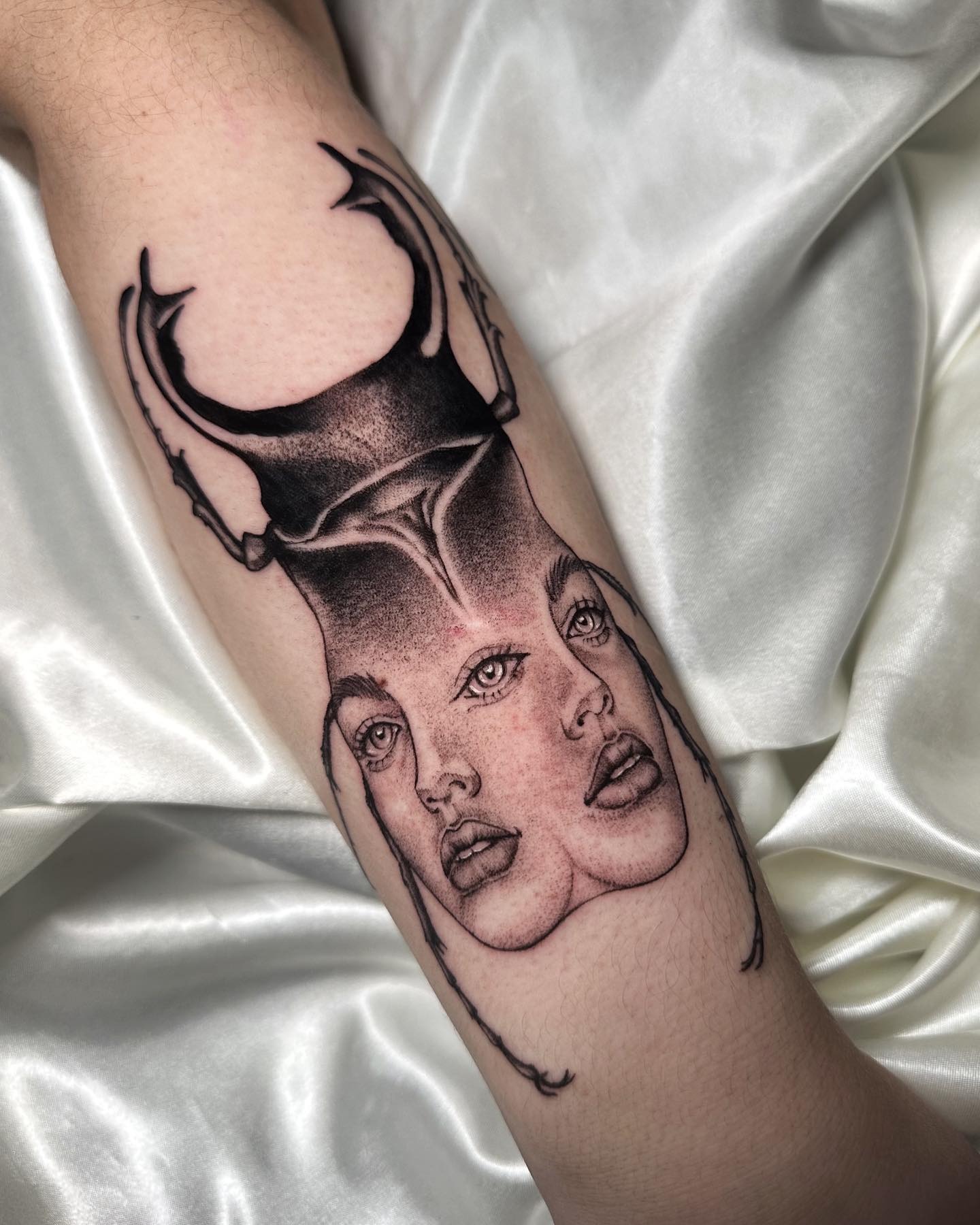 Dual Face and Horned Crown Tattoo Tattoo Design