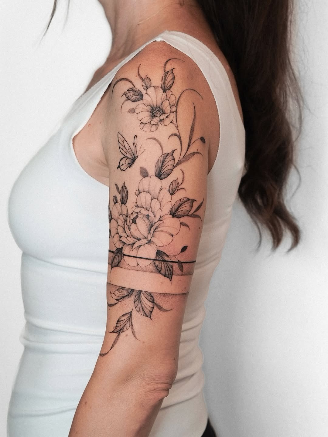 Elegant floral armband tattoo with butterflies Tattoo Design