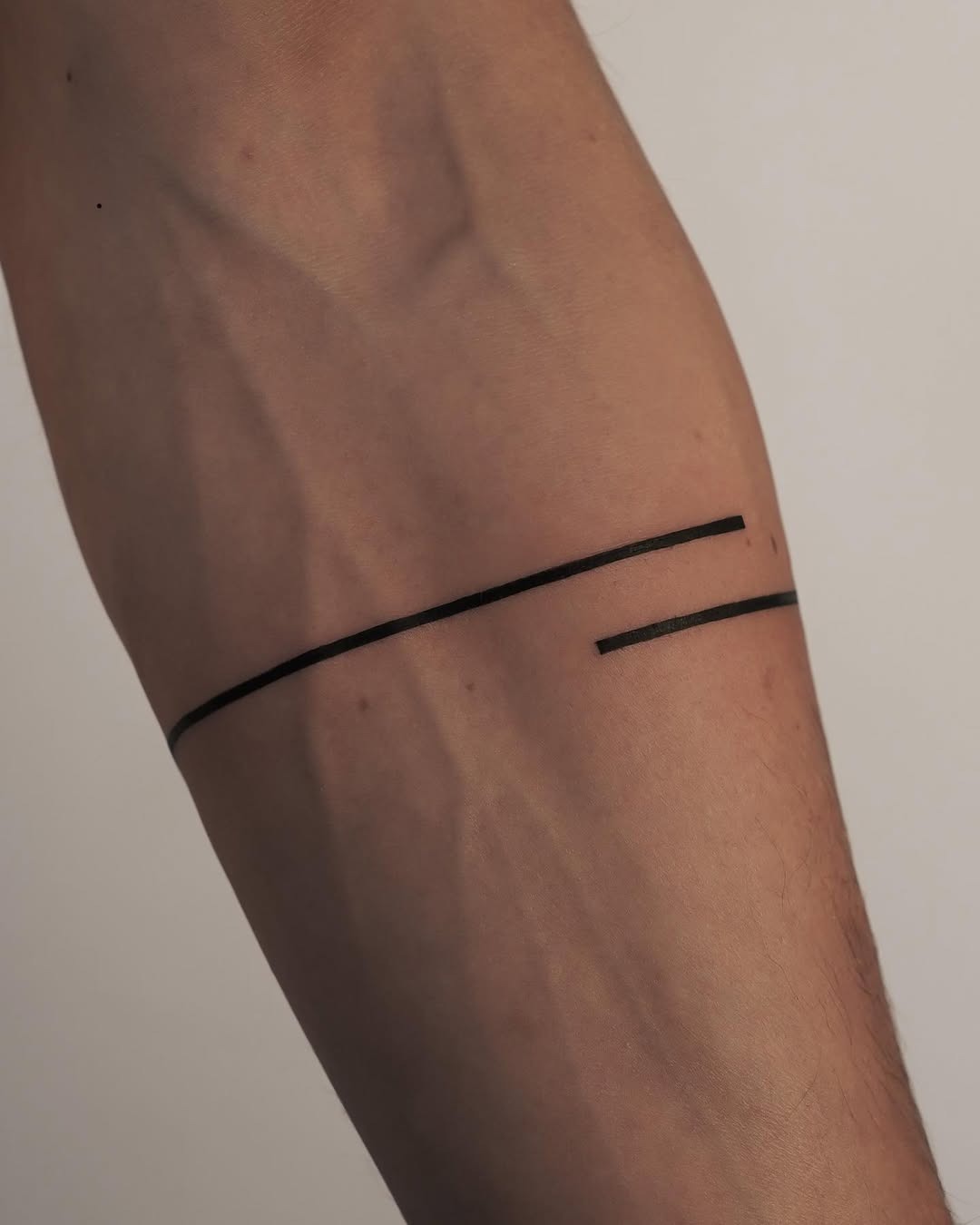 Sleek and modern minimalist armband tattoo Tattoo Design