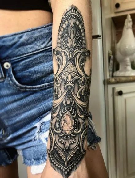 Modern Armor Sleeve with Cross and Gothic Accents Tattoo Design