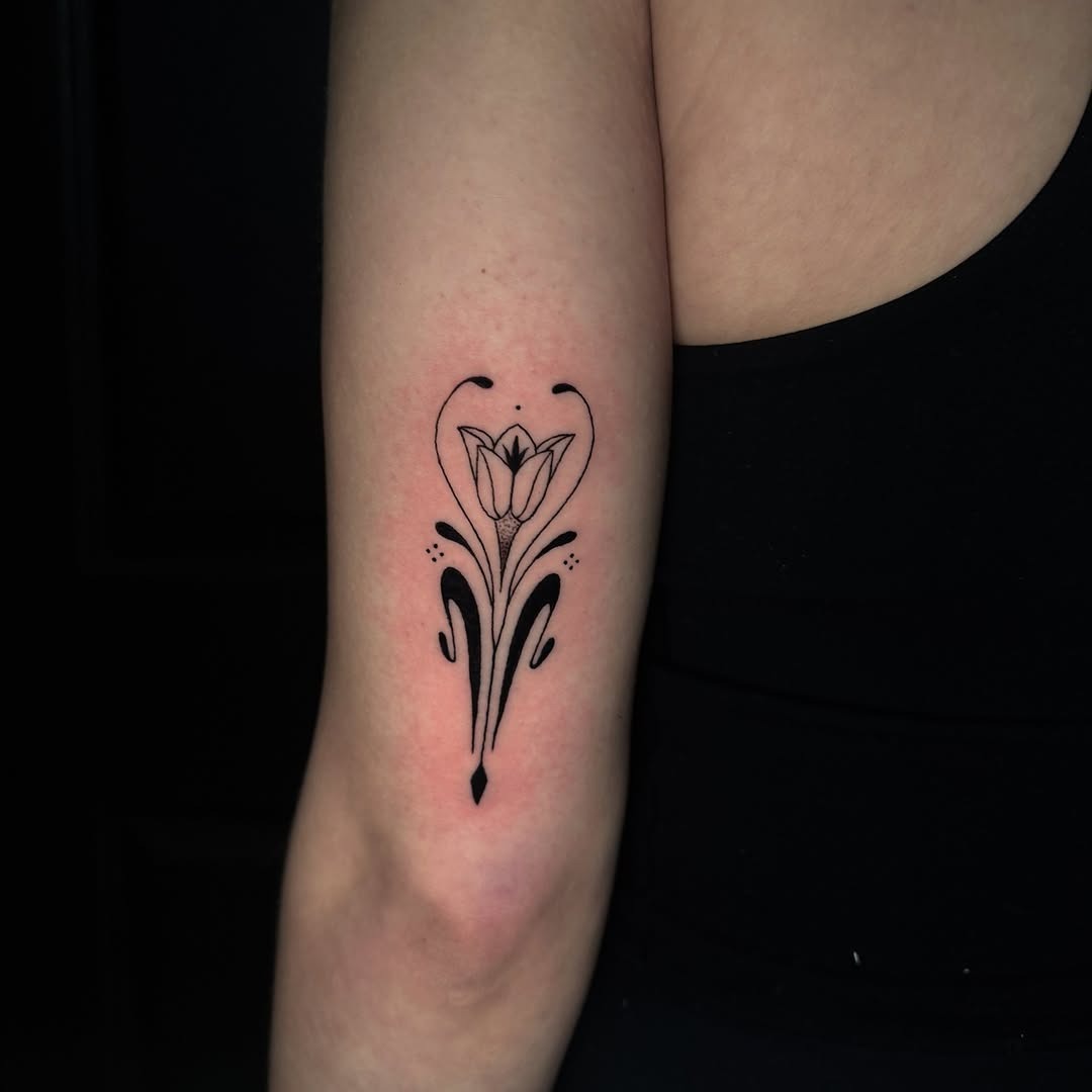Elegant floral design tattoo with art nouveau flair Tattoo Design