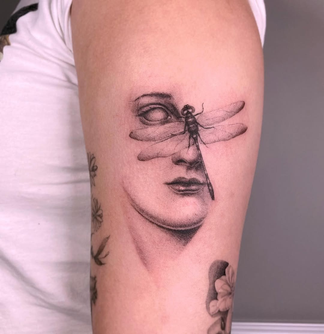 Elegant dragonfly tattoo merging beauty and art Tattoo Design