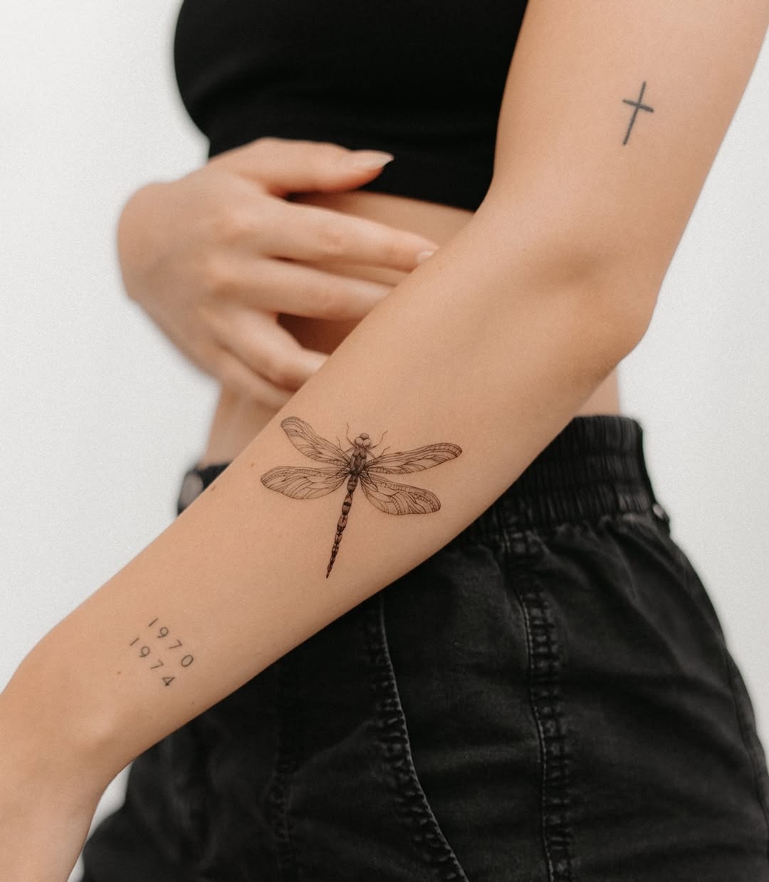 Elegant Dragonfly Tattoo on Arm Tattoo Design