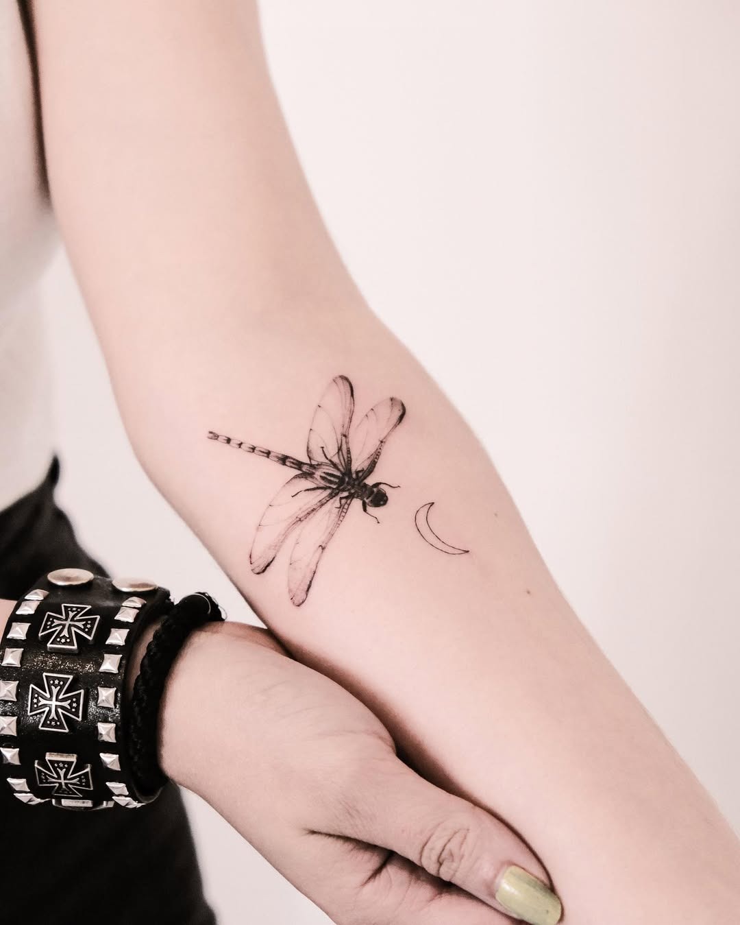 Elegant dragonfly tattoo with a crescent moon Tattoo Design