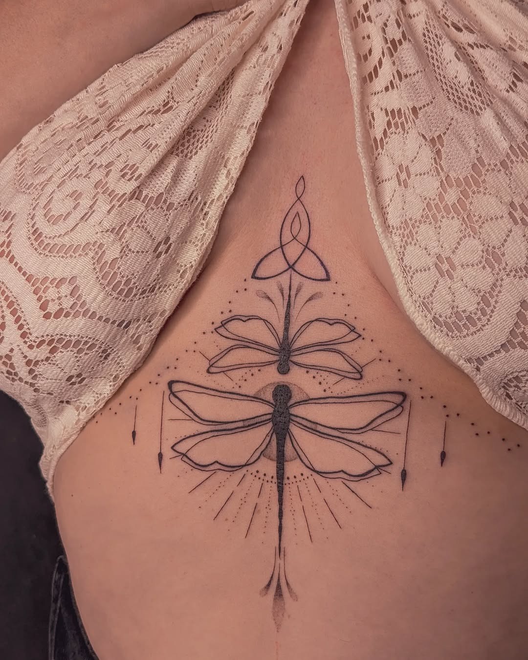 Intricate Dragonfly Tattoo with Floral Elements Tattoo Design