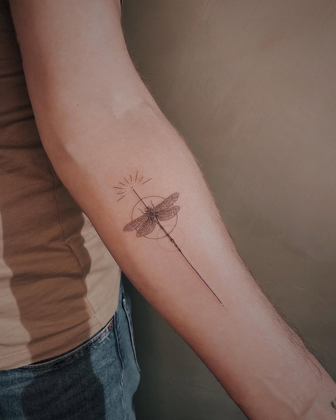 Minimalist Dragonfly Tattoo on Arm Tattoo Design