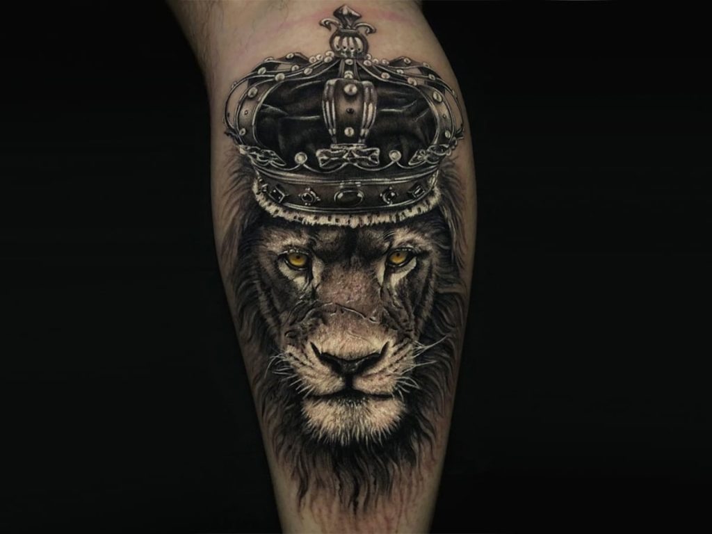 Regal and powerful, this lion tattoo is a bold statement piece that exudes authority and strength.