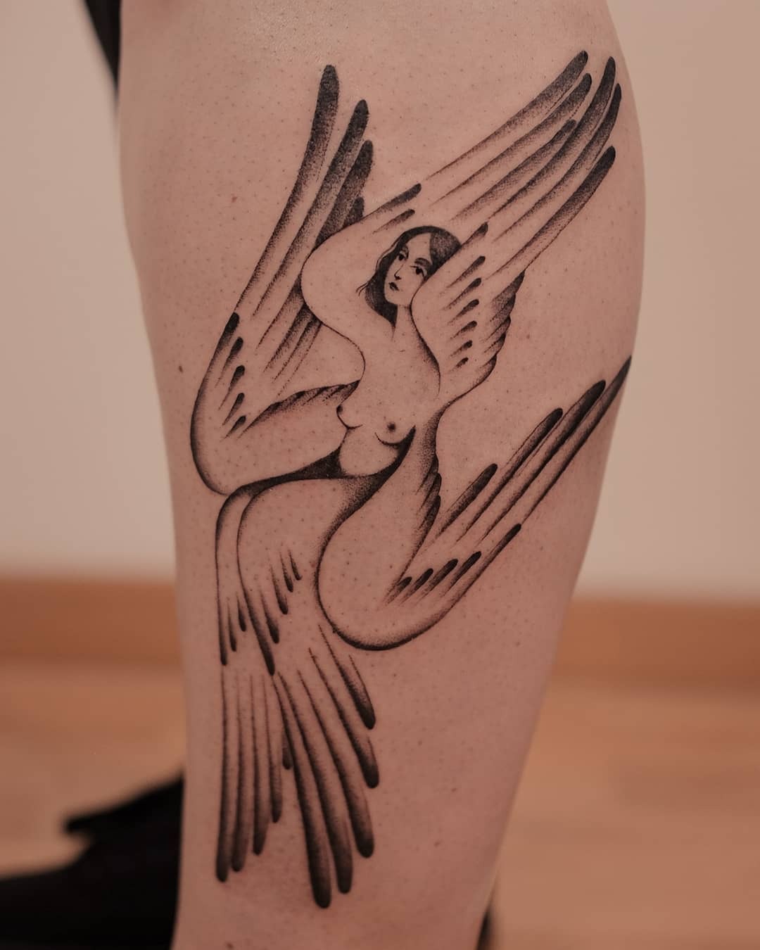 A striking blend of femininity and freedom Tattoo Design