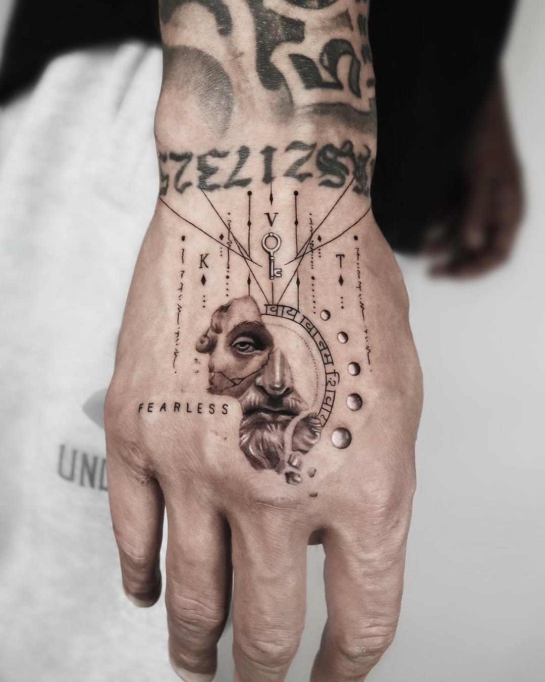 Intricate design showcasing fearless artistry on hand Tattoo Design