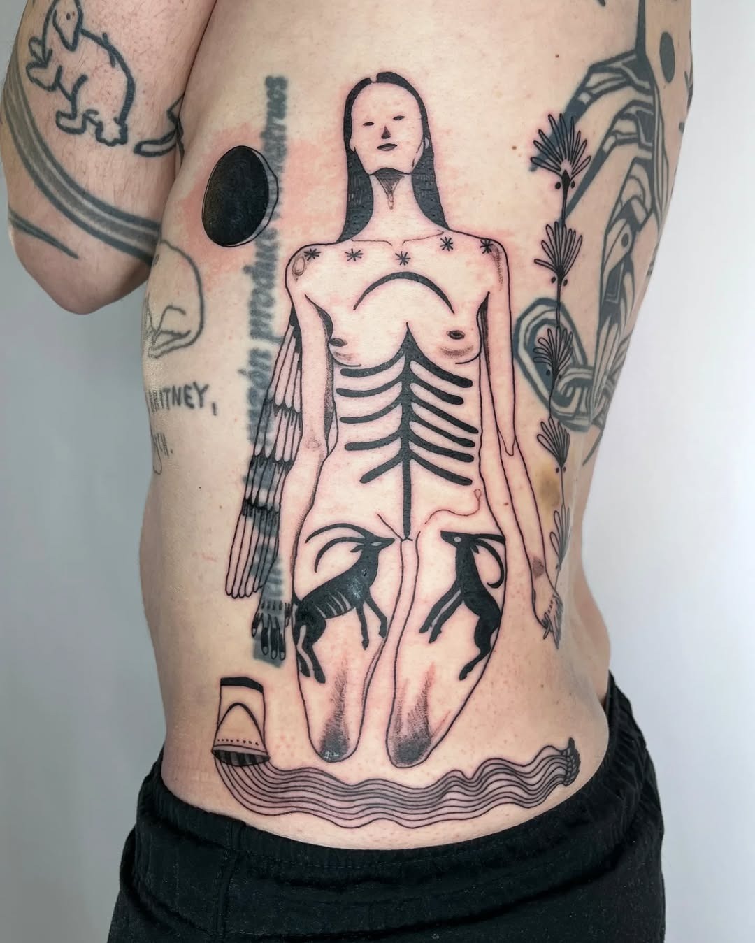 Intricate skeletal design showcasing vivid storytelling Tattoo Design
