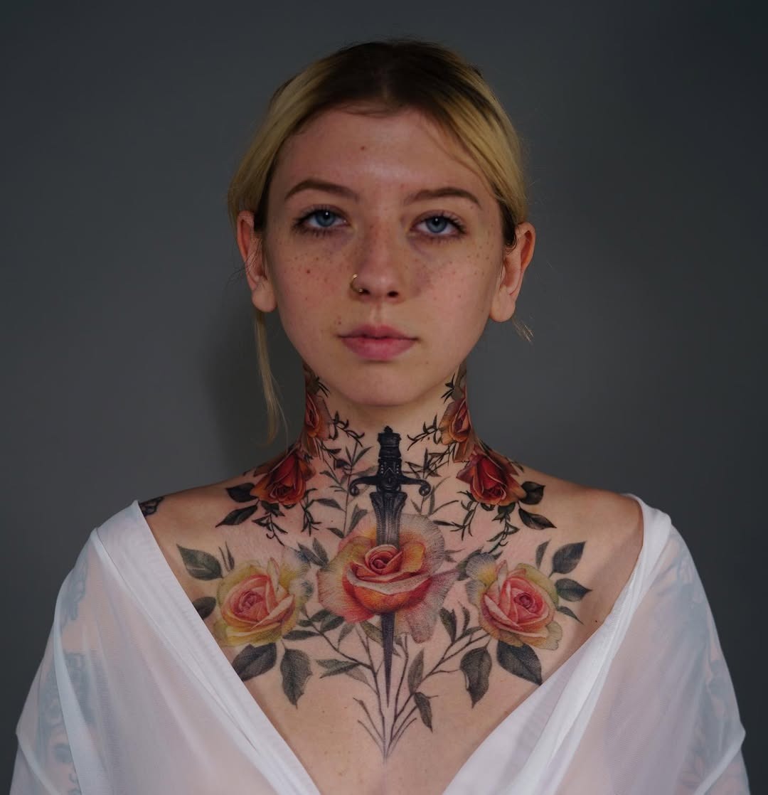 Stunning floral and dagger neck tattoo art Tattoo Design