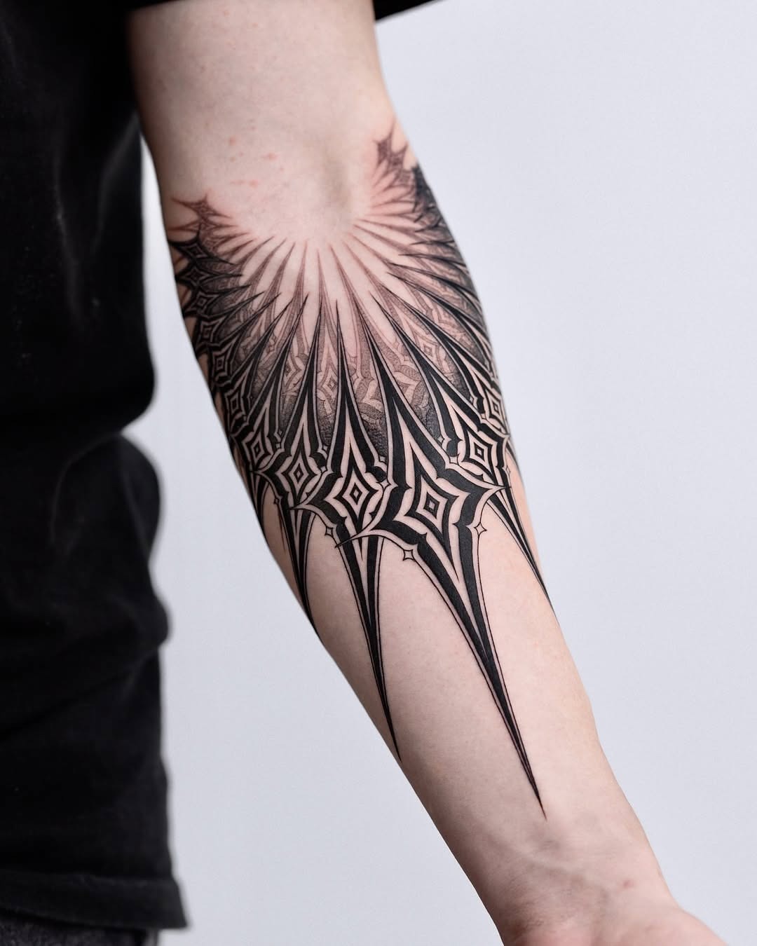 Stunning geometric black ink forearm tattoo design Tattoo Design