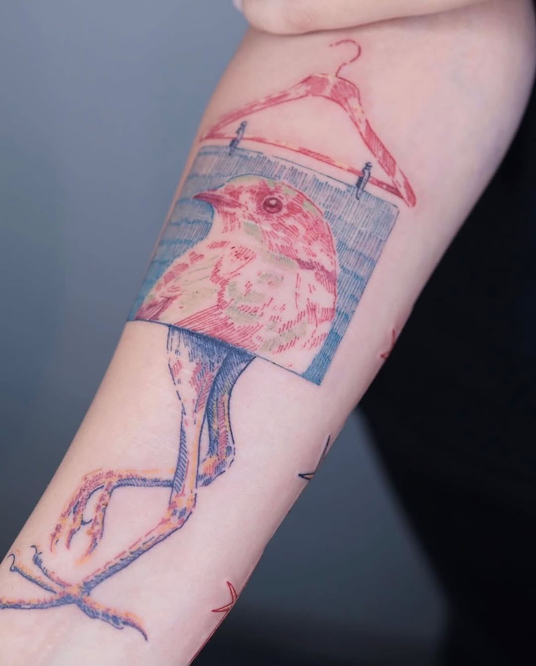 Unique tattoo of a bird in a frame Tattoo Design