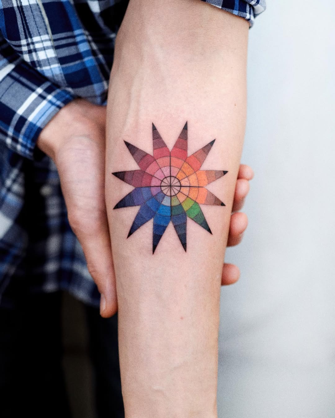 Vibrant star tattoo showcasing color harmony Tattoo Design